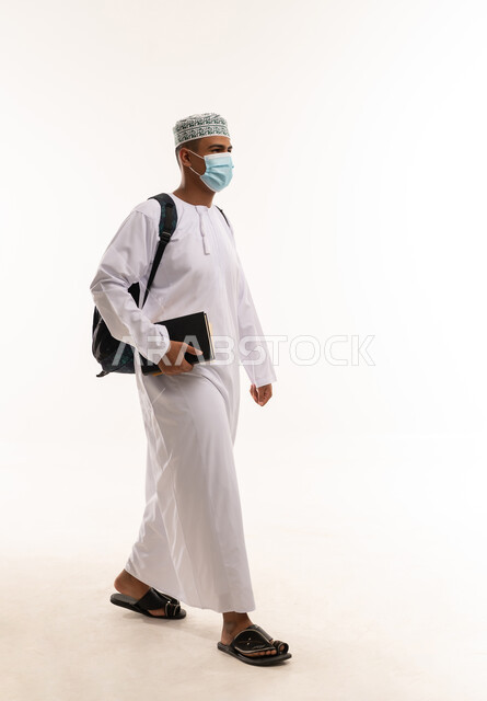 Omani Man in Traditional Dishdasha Wearing Face Mask