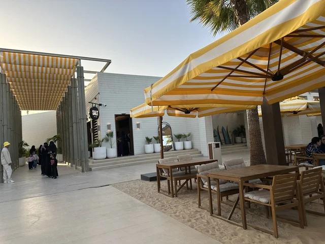 Arab women in traditional dress at Salt Al Bahr, a family-friendly beach and entertainment destination located on the Corniche Road in Al Khobar, Saudi Arabia. Further renovations and upgrades are scheduled for January 3, 2026. Pet-friendly.