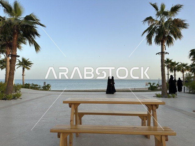 Seats and chairs for relaxation on a sandy promenade. Salt Al Bahr is a family-friendly beach and entertainment destination located on the Corniche Road in Al Khobar, Saudi Arabia. Further renovations and upgrades are scheduled for January 3, 2026. A variety of activities are available, including trampolines for children, paddleboarding, and table tennis.