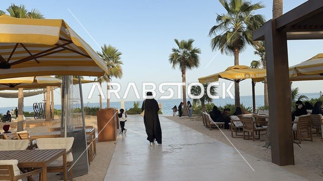 Arab women in traditional dress at Salt Al Bahr, a family-friendly beach and entertainment destination located on the Corniche Road in Al Khobar, Saudi Arabia. Further renovations and upgrades are scheduled for January 3, 2026. Pet-friendly.