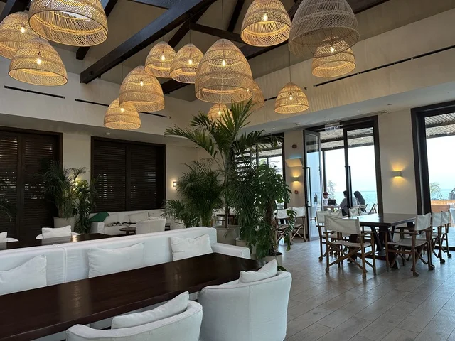 A hotel and accommodation in Salt Beach is a family-friendly recreational and beach destination located on the Corniche Road in Al Khobar, Saudi Arabia, featuring a sandy beach with umbrellas and palm trees, with additional renovations and developments on January 3, 2026.