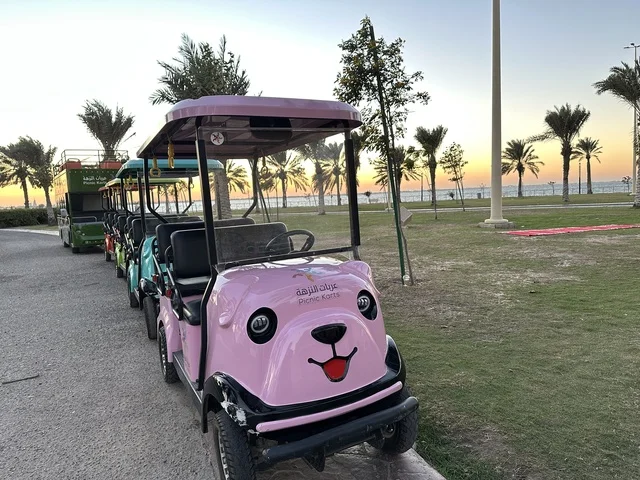The fun picnic cart, the waterfront in the city of Dammam at sunset, a vibrant area and a main outlet for residents and visitors of the Eastern Province, a corniche overlooking the Arabian Gulf in the Kingdom of Saudi Arabia.