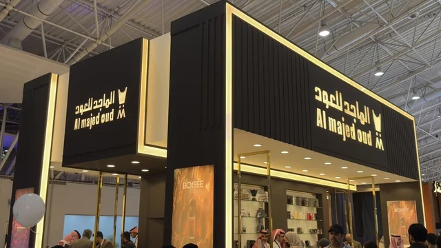 The Al-Majid Oud Pavilion banner, the Blue Oud and International Perfume Exhibition in Riyadh, was held from December 2025 to January 2026 in the Kingdom of Saudi Arabia. It features major annual events that offer a sensory experience including shopping, learning about the perfume industry, and workshops.