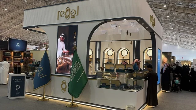 The flag of the Kingdom is in front of the pavilion at the Blue Oud and International Perfumes Exhibition in Riyadh, held from December 2025 to January 2026 in the Kingdom of Saudi Arabia. It features major annual events that offer a sensory experience including shopping, learning about the perfume industry, and workshops.