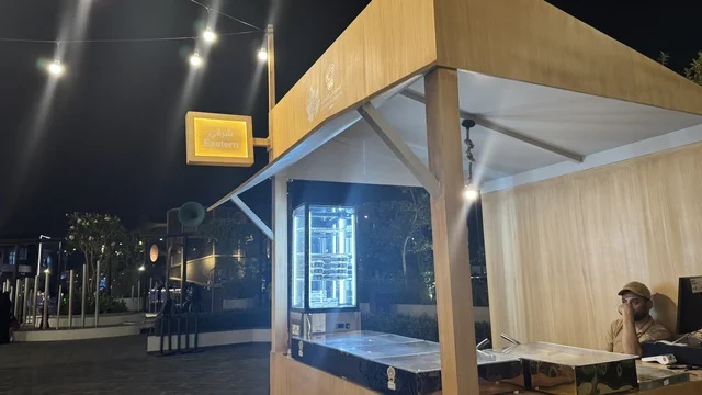 The Eastern section at the Luqma event in Jeddah in January 2026, traditional Hijazi sweets and baked goods, a luxurious tasting experience in the Kingdom of Saudi Arabia, a family and popular atmosphere, tasting the flavor of traditional local food.