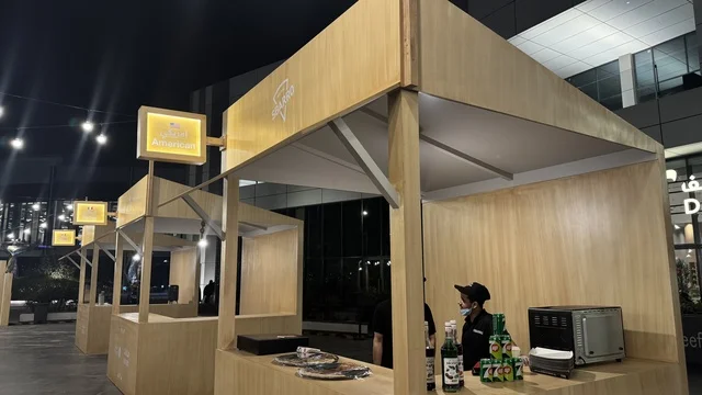 An event called "Luqma" in the city of Jeddah in January 2026, featuring traditional Hijazi sweets and baked goods, a family-friendly and popular atmosphere, tasting the flavors of traditional local food, a luxurious tasting experience in the Kingdom of Saudi Arabia.