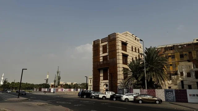Balconies and wooden windows, architectural arts in the historic city of Jeddah, drone photography of alleys and traditional designs, tourist attractions in the Kingdom of Saudi Arabia, ancient archaeological buildings, projects to revitalize the area.