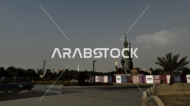 A collection of heritage hotels and modern cafes, architectural arts in the historical city of Jeddah, drone photography of alleys and traditional designs, tourist attractions in the Kingdom of Saudi Arabia, ancient archaeological buildings, projects to revitalize the area.