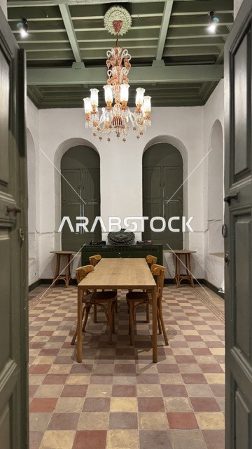 A dining room in one of the old museums, distinctive interior design, a museum in historic Jeddah in the Kingdom of Saudi Arabia, information in an educational or research framework, personal and official documents, memorabilia, and items of cultural value.