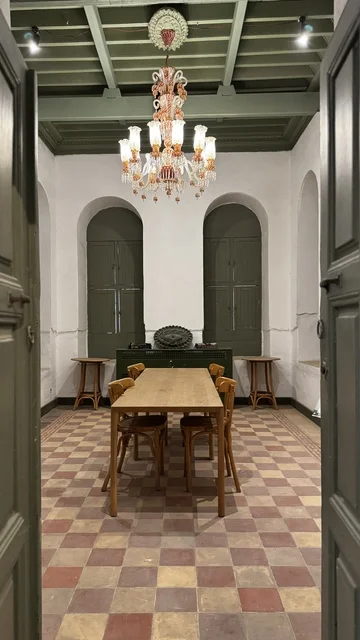 A dining room in one of the old museums, distinctive interior design, a museum in historic Jeddah in the Kingdom of Saudi Arabia, information in an educational or research framework, personal and official documents, memorabilia, and items of cultural value.