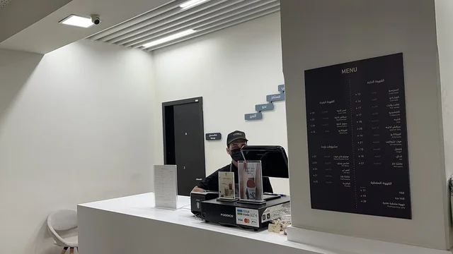 A café in the House of Culture in Dammam, Eastern Province, Saudi Arabia, the Dammam Public Library, educational and interactive activities for all groups, a cultural and knowledge landmark that enhances creativity and the arts, diverse cultural and community events, an inspiring environment that brings together cultures, knowledge, and art, spaces for exhibitions and workshops.