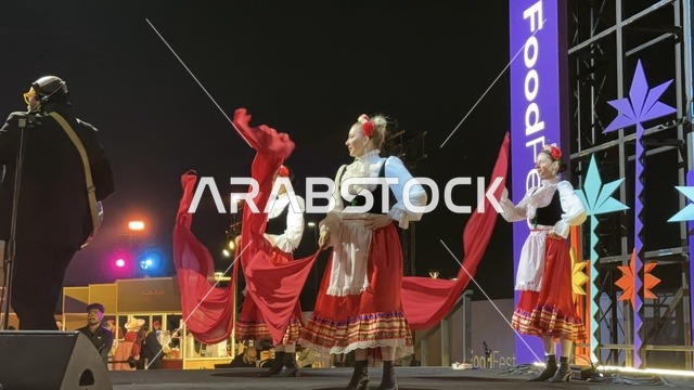 A musical performance and Mexican folk dance at a food festival in the outdoor gardens of Ithra in Dhahran, Eastern Province, Saudi Arabia, on December 28, 2025. Enjoyable outdoor sessions, a global food experience, international and local restaurants, and a family-friendly and entertaining atmosphere.
