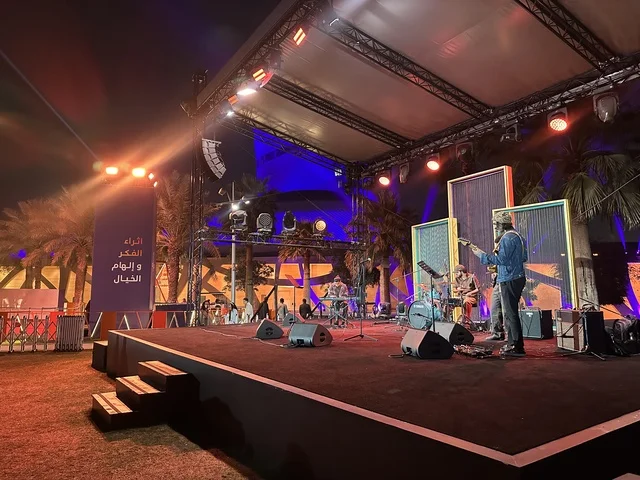 A musical and singing performance at a food festival in the Ithra outdoor gardens in Dhahran, Eastern Province, Saudi Arabia, on December 28, 2025. A global tasting experience, enjoyable outdoor sessions, international and local restaurants, family-friendly and entertaining atmosphere.