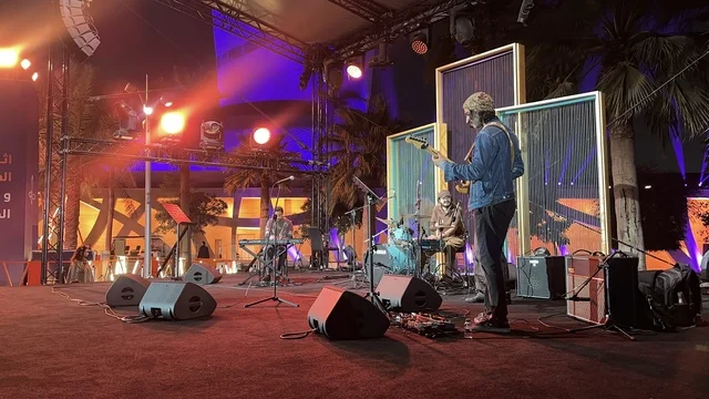 A musical and singing performance at a food festival in the Ithra outdoor gardens in Dhahran, Eastern Province, Saudi Arabia, on December 28, 2025. A global tasting experience, enjoyable outdoor sessions, international and local restaurants, family-friendly and entertaining atmosphere.