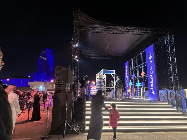 A musical and singing performance at a food festival in the Ithra outdoor gardens in Dhahran, Eastern Province, Saudi Arabia, on December 28, 2025. A global tasting experience, enjoyable outdoor sessions, international and local restaurants, family-friendly and entertaining atmosphere.