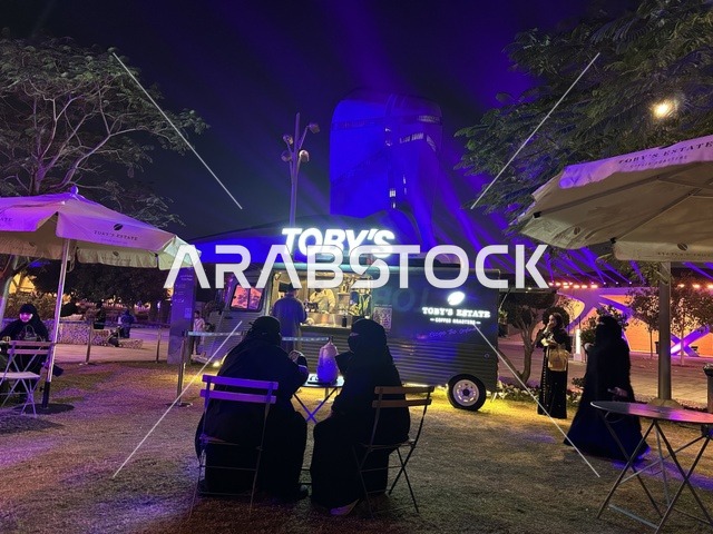 International and local restaurants at a food festival in the outdoor gardens of Ithra in Dhahran, Eastern Province, Saudi Arabia, on December 28, 2025. A global tasting experience, family-friendly and entertaining atmosphere, enjoyable outdoor seating.