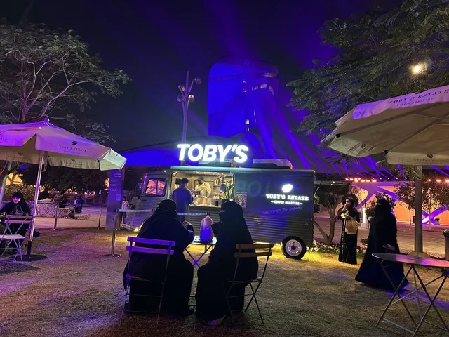 International and local restaurants at a food festival in the outdoor gardens of Ithra in Dhahran, Eastern Province, Saudi Arabia, on December 28, 2025. A global tasting experience, family-friendly and entertaining atmosphere, enjoyable outdoor seating.