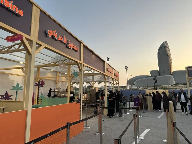 A global tasting experience at international and local restaurants during a food festival in the Ithra outdoor gardens in Dhahran, Eastern Province, Saudi Arabia, on December 28, 2025. Family-friendly and entertaining atmosphere, enjoyable outdoor seating.