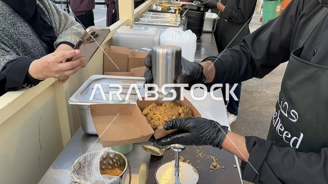International and local restaurants at a food festival in the Ithra outdoor gardens in Dhahran, Eastern Province, Saudi Arabia, on December 28, 2025. Family-friendly and entertaining atmosphere, a global tasting experience, enjoyable outdoor seating.