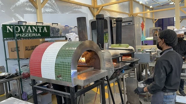 International and local restaurants at a food festival in the Ithra outdoor gardens in Dhahran, Eastern Province, Saudi Arabia, on December 28, 2025. Family-friendly and entertaining atmosphere, a global tasting experience, enjoyable outdoor seating.