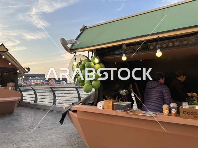 A kiosk selling Chinese food, taste a sushi dish, activate tourism and economic movement, a tourist and entertainment attraction, the global city January 2026 on the shores of the Arabian Gulf and Lake Sehat in the Eastern Province of Dammam, get to know the different cultures of the countries, a place to spend enjoyable time with family.