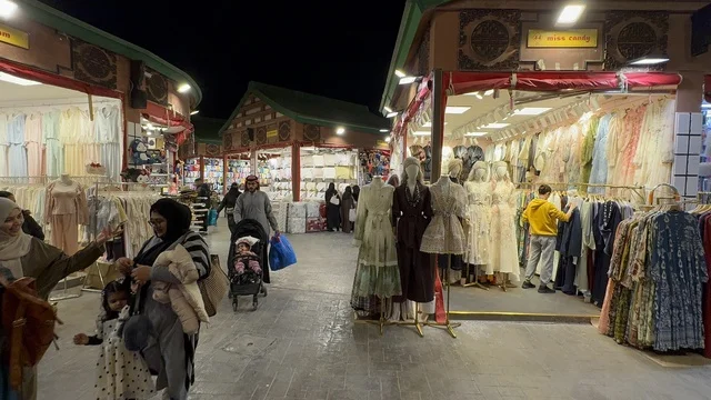 A market for selling traditional clothing, learn about the cultures of different countries, a tourist and entertainment attraction, stimulating tourism and economic activity, the global city January 2026 on the shores of the Arabian Gulf and Lake Sehat in the Eastern Province of Dammam, a place to spend enjoyable time with family.