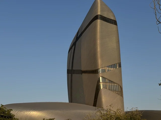 A modern architectural landmark with an innovative design, an iconic building with a contemporary metal facade that reflects urban development and architectural innovation, the King Abdulaziz Center for World Culture (Ithra) in Dhahran, Eastern Province, Saudi Arabia, is a prominent cultural and tourist attraction.