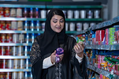 Arab Woman Shopping for Groceries in Supermarket