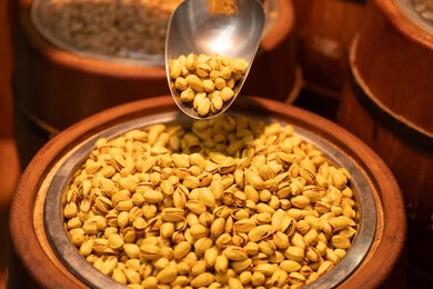 Roasted Pistachios in Wooden Barrel at Spice Market