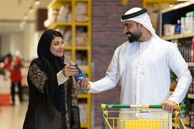 Emirati Couple Shopping for Products in Supermarket