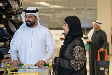 Emirati Couple Shopping for Kitchenware in Mall