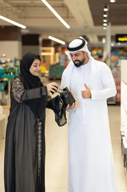 Emirati Couple Shopping for Home Goods in Mall