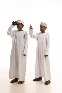 Omani Boys in Traditional Dress with Binoculars