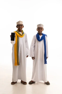 Omani Boys in Traditional Dress with Smartphone