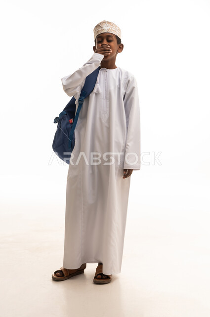 Tired Omani Boy with School Backpack on White Background