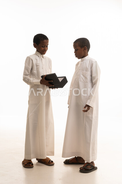 Saudi Boys in Traditional Thobes with Gift Box