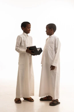 Saudi Boys in Traditional Thobes with Gift Box