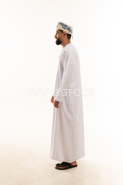 Omani Man in Traditional Dishdasha Side Profile