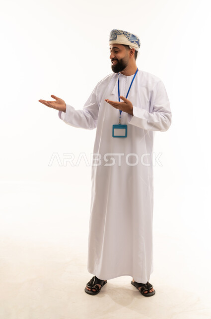 Omani Man in Traditional Dress Gesturing in Studio