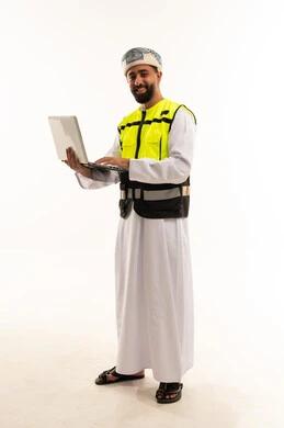 Omani Engineer with Laptop in Safety Vest
