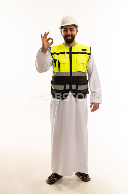 Saudi Engineer in Safety Vest Making Okay Hand Sign
