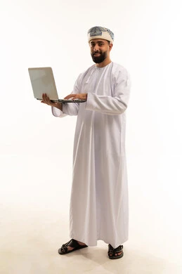 Omani Man Using Laptop on White Background