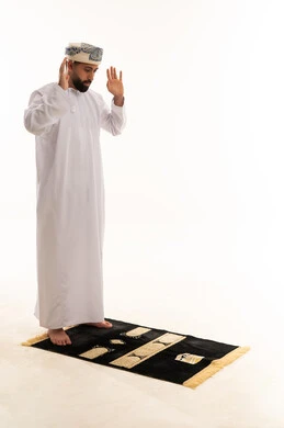 Omani Man Performing Prayer Takbir on White Background