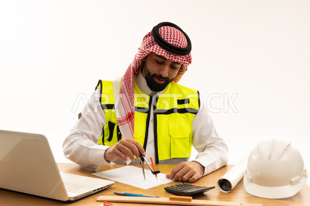 Saudi Male Engineer Working with Architectural Tools