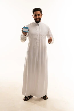 Saudi Man in Thobe Holding ID Card on White Background