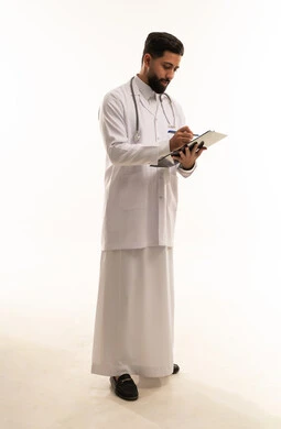 Saudi Male Doctor in White Lab Coat with Clipboard