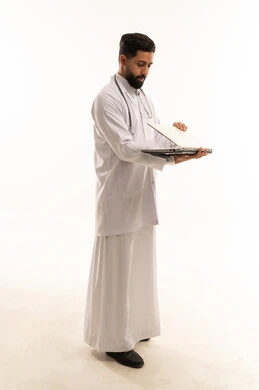 Saudi Male Doctor with Laptop on White Background