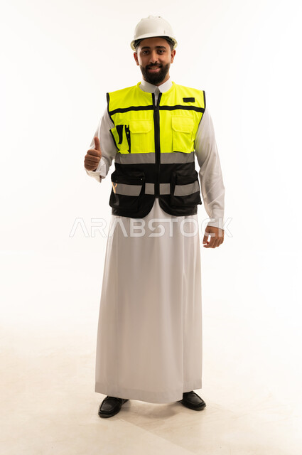 Saudi Engineer in Safety Gear Thumbs Up Portrait