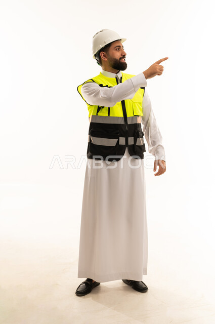 Saudi Engineer in Safety Gear Pointing on White Background