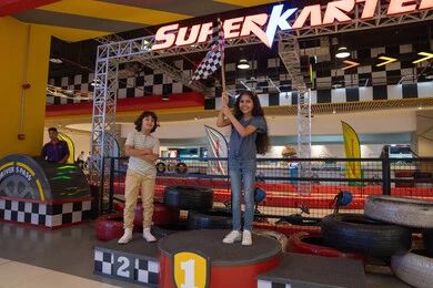 Saudi Children on Winner Podium at Karting Track